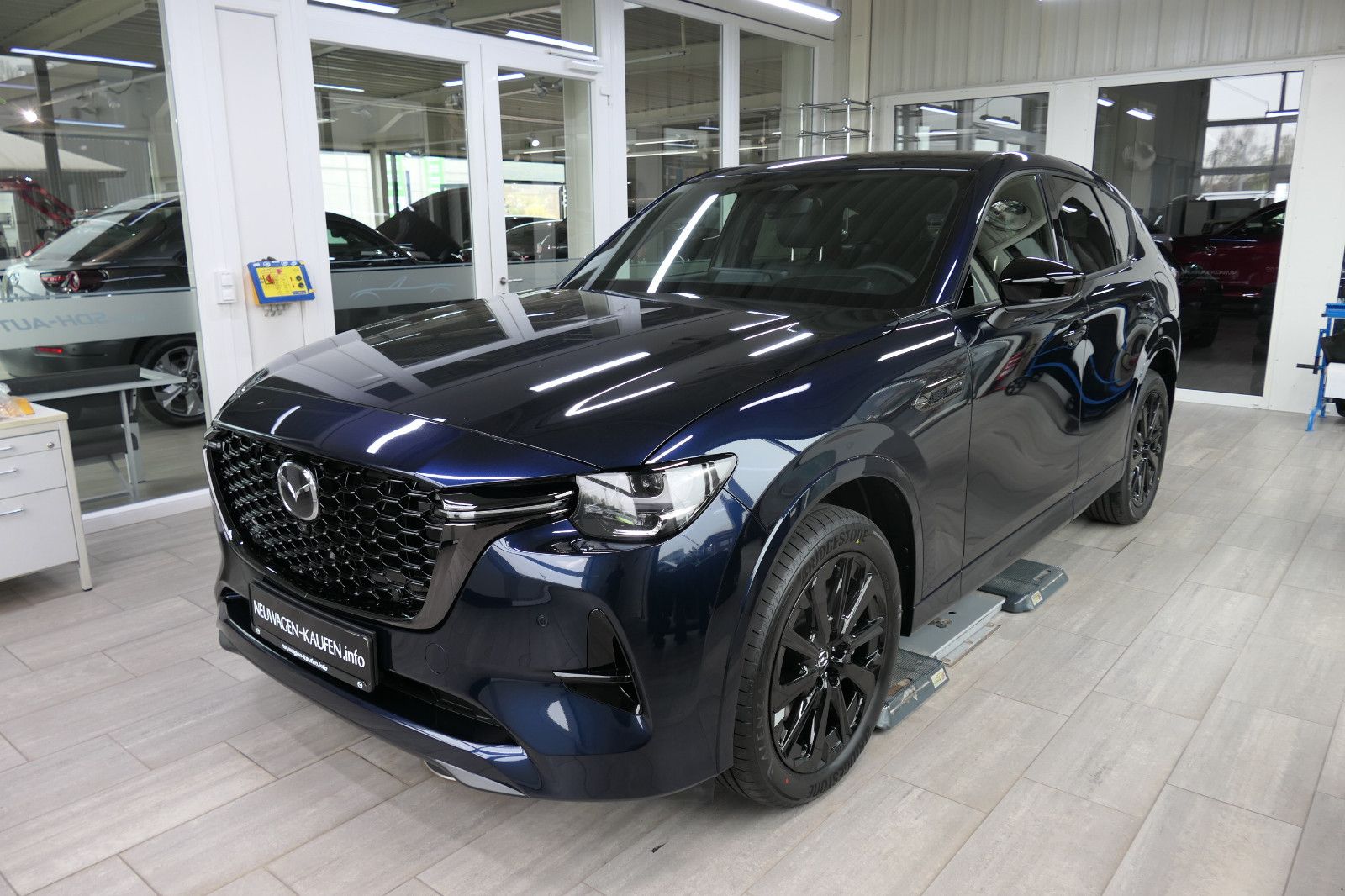 Mazda CX-60 2026  SKYACTIV PHEV HOMURA-Plus > Aktion imagem 2