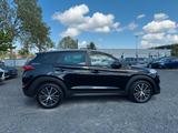 Hyundai TUCSON PASSION 2WD/AUTOMATIK/NAVI/KAMERA/TÜV NEU - Hyundai Tucson Passion mit Benzin-Antrieb