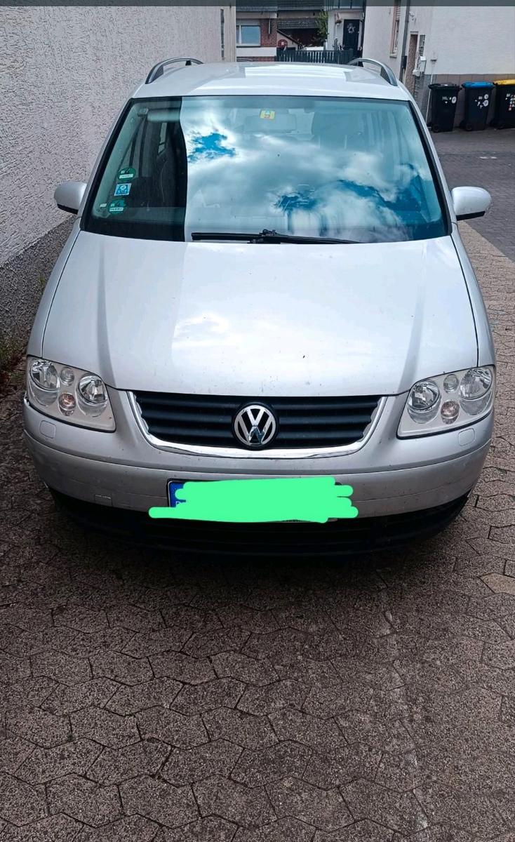 Volkswagen Touran 2006 — engine 116 HP (85kW)