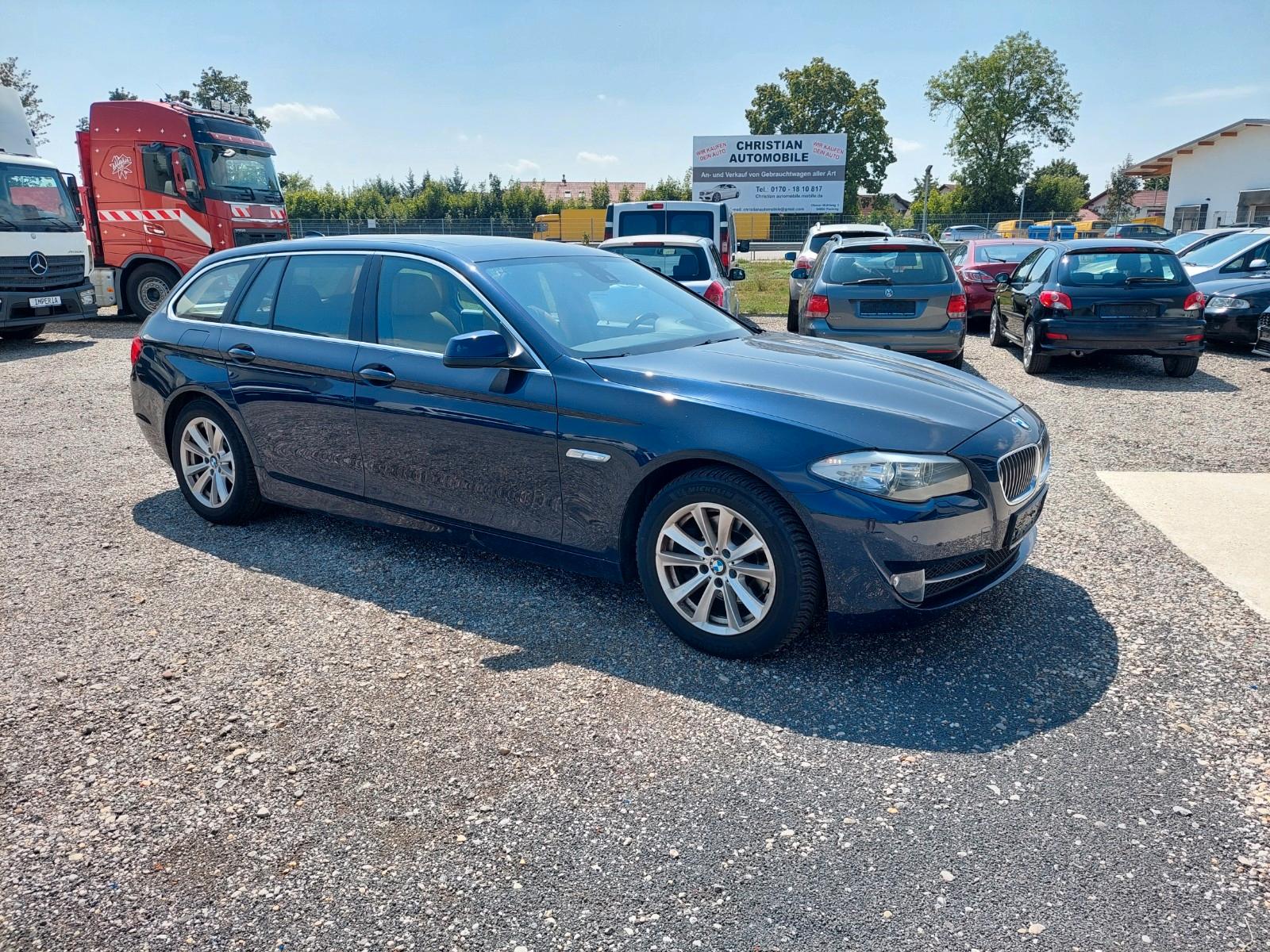 BMW 523 2010 — rear view