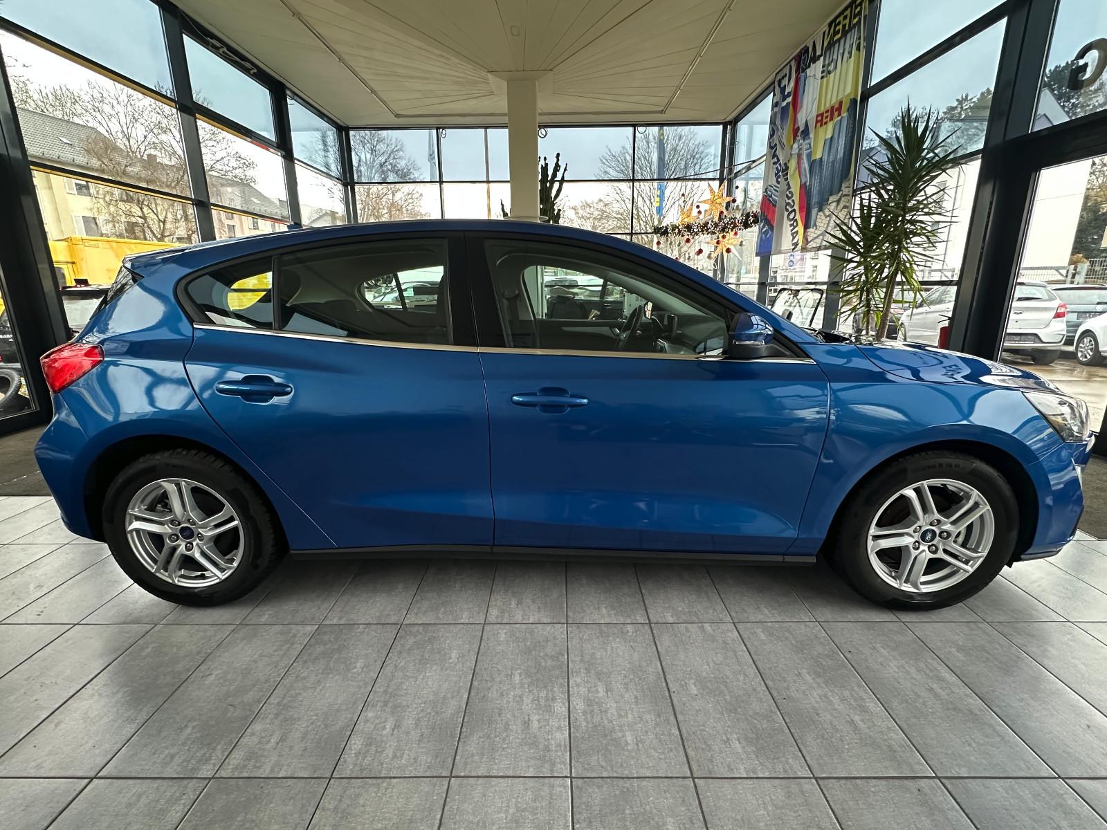Ford Focus Lim. *erst 16000 km*bis zu 10J. Garantie*
