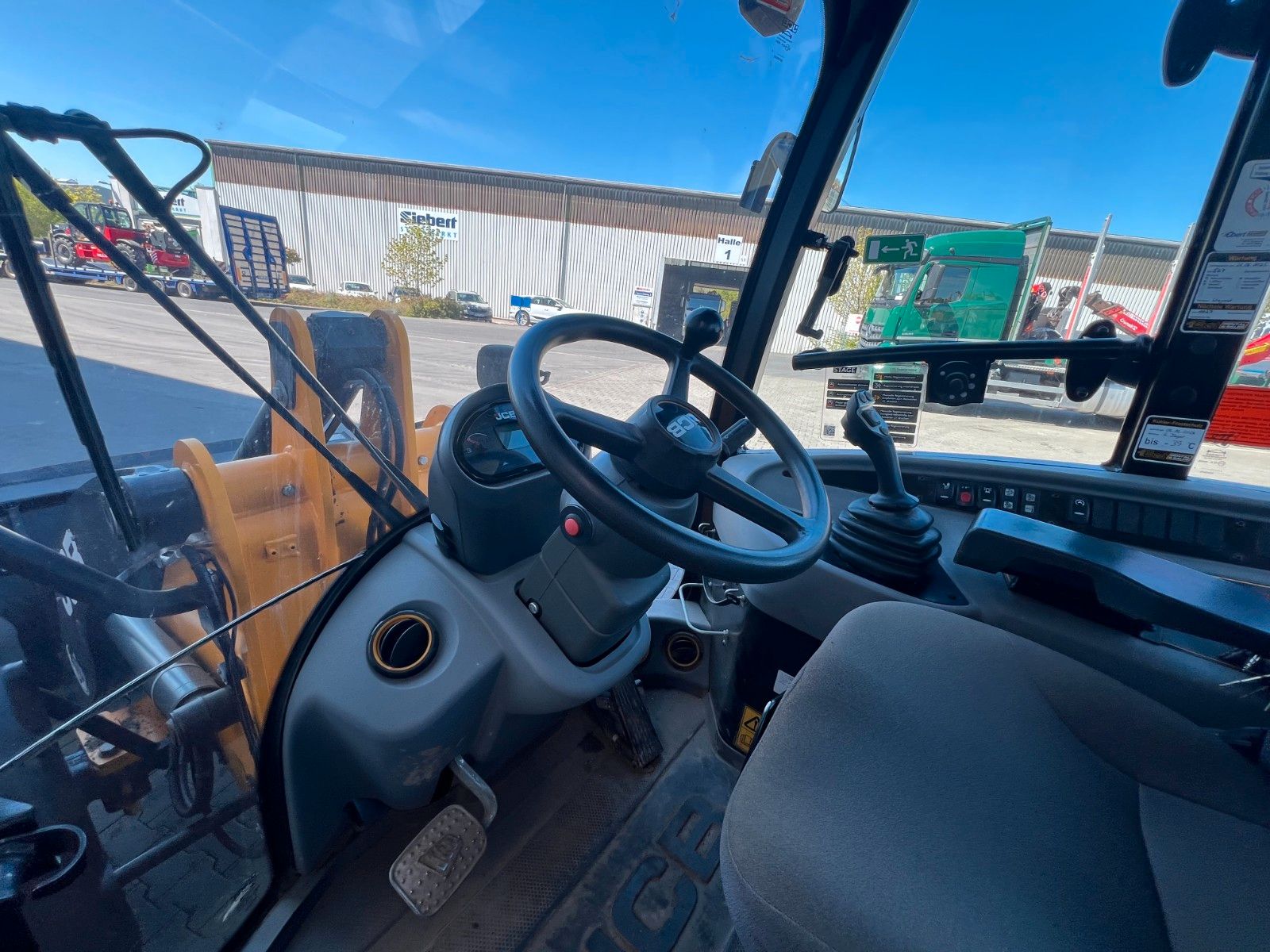 Fahrzeugabbildung JCB 409 SV / nur 758h! / Klappschaufel / Gabel