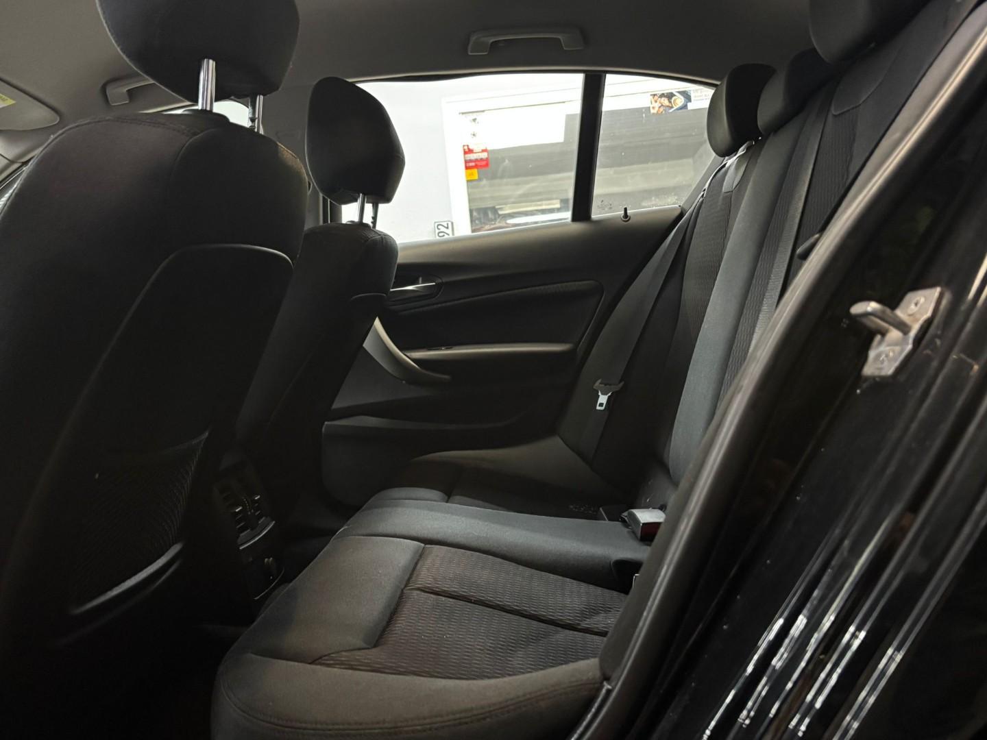 BMW 114 2014 — photo 15