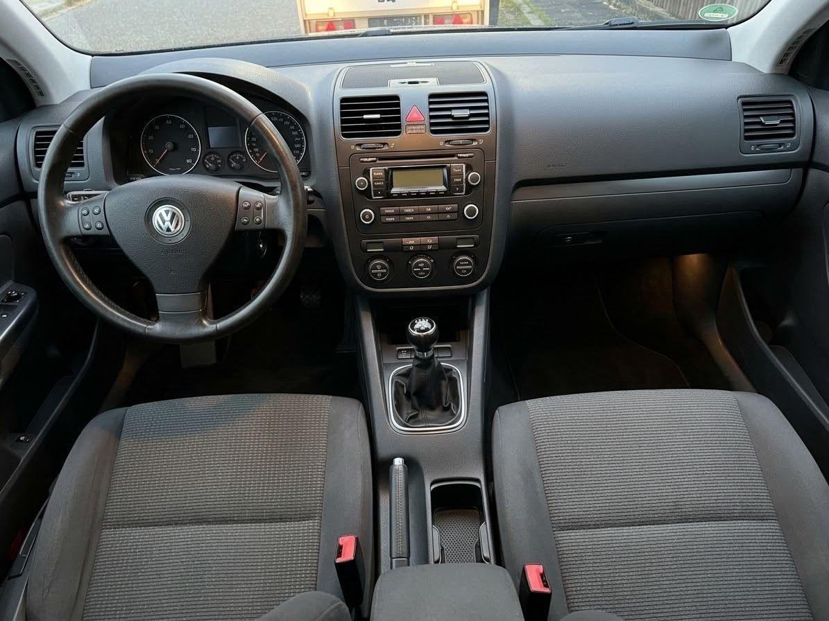 Volkswagen Golf 2009 — engine 102 HP (75kW)