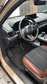 Mazda MX-30 e-Skyactiv R-EV Makoto  - Mazda MX-30 Makoto mit Hybrid-Antrieb (Benzin/Elektro)