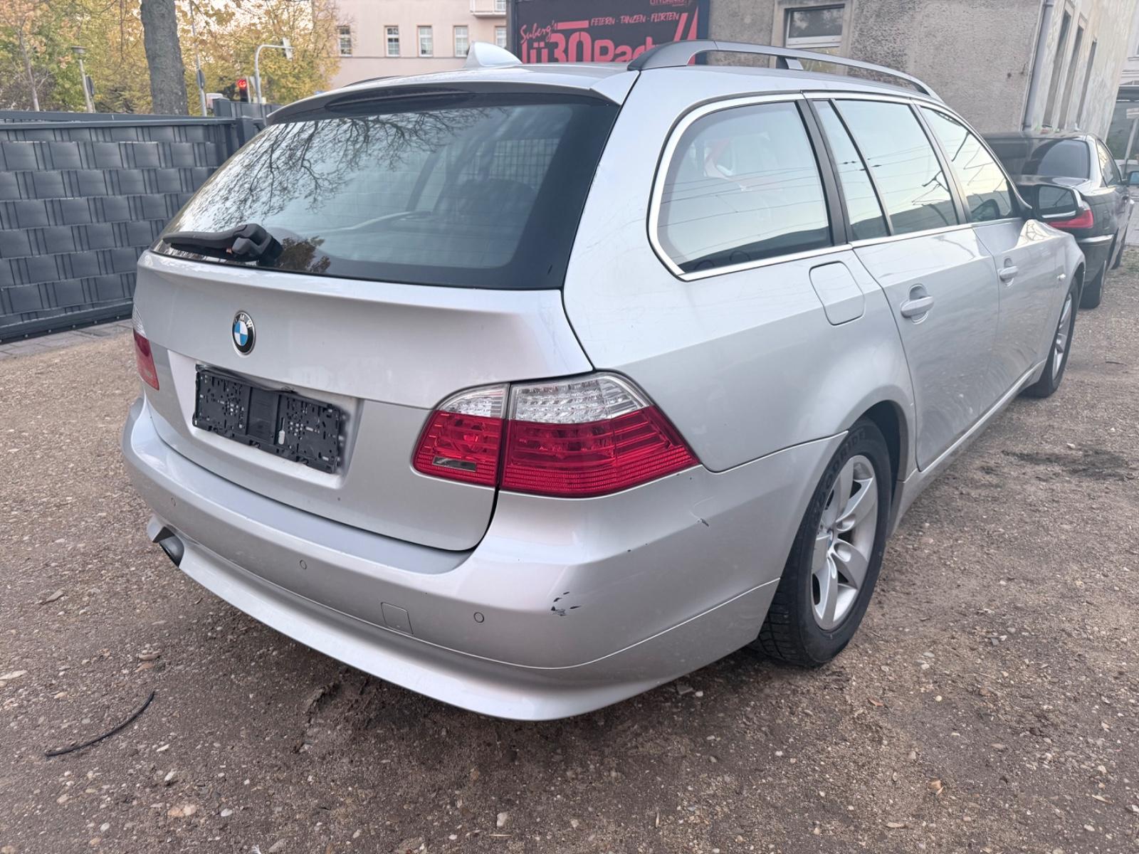 BMW 520 2010 — rear view