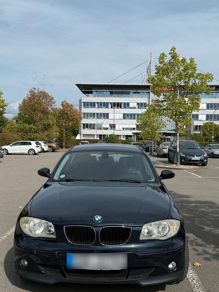 BMW 116 2006 — interior