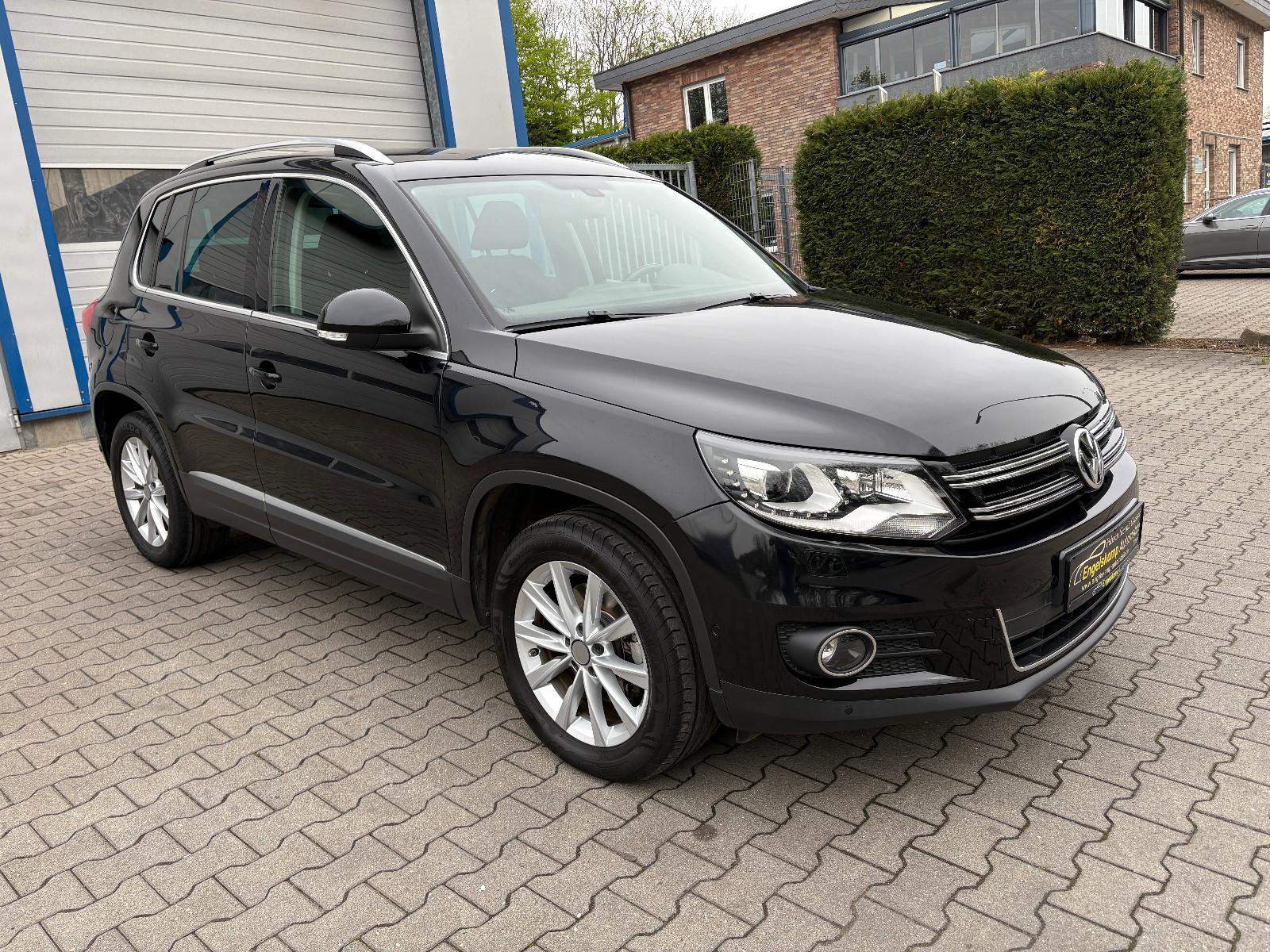 Volkswagen Tiguan 1.4 TSI Sport/NAVI/AHK/SCHECKH.KEYLE/1.HD