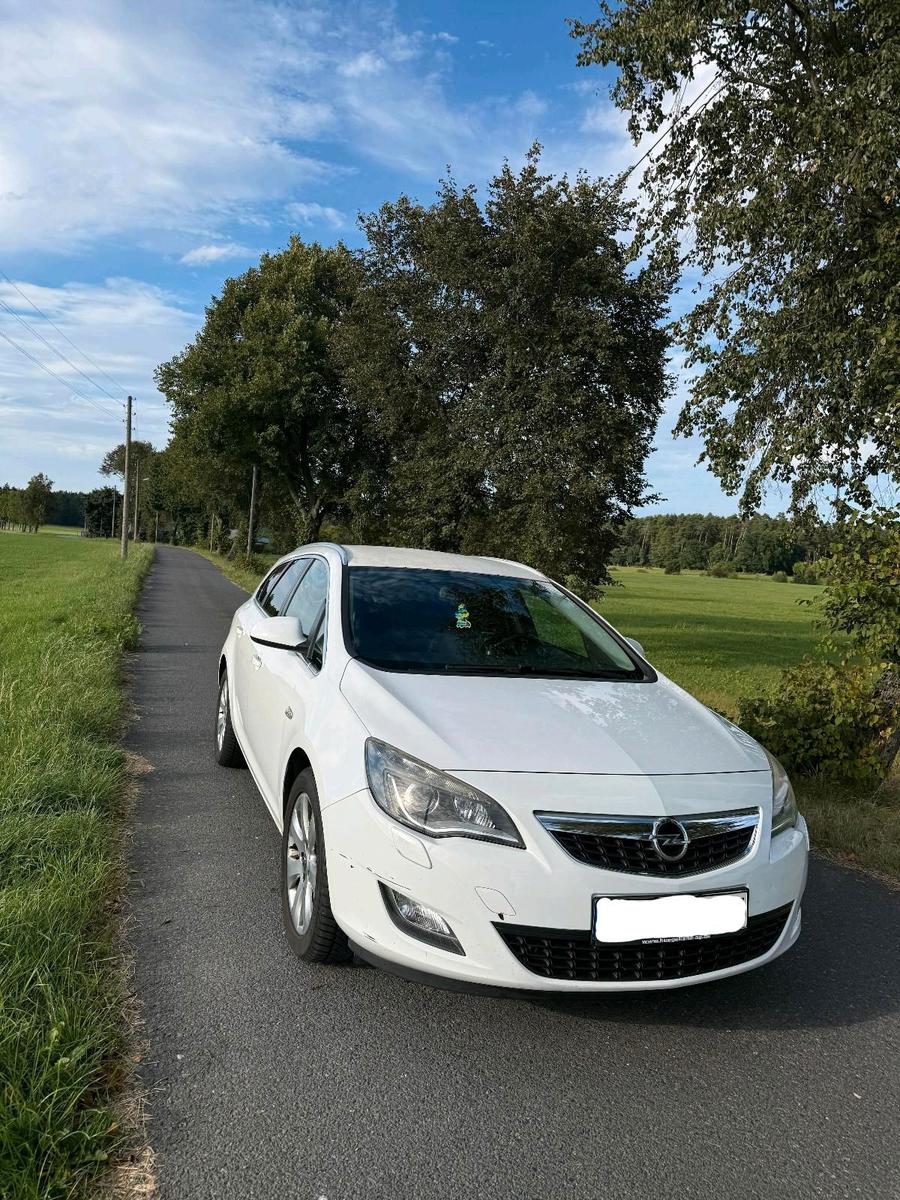 Opel Astra 2011 — двигун 125 HP (92kW)