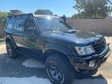 Nissan Patrol GR3.0 TD di 5 porte - Nissan Patrol mit Schiebedach