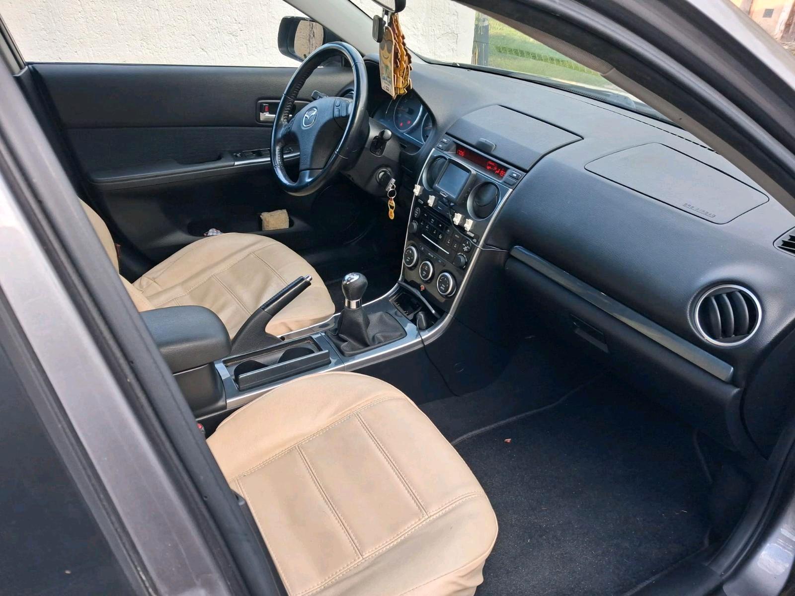 Mazda CX-5 2006 — engine 120 HP (88kW)