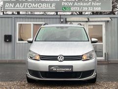Fahrzeugabbildung Volkswagen Touran 7 Sitze SCHECKHEFTGEPFLEGT