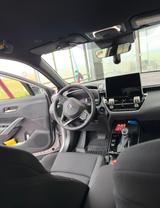 Toyota Corolla Cross 2.0-l-VVT-i Hybrid Teamplayer ... - silberne Toyota Corolla Cross