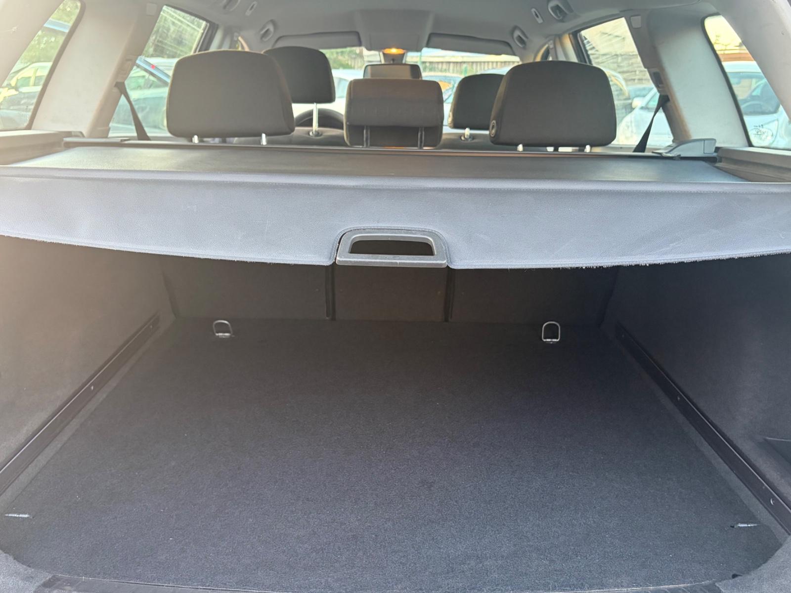 Opel Astra 2004 — photo 30