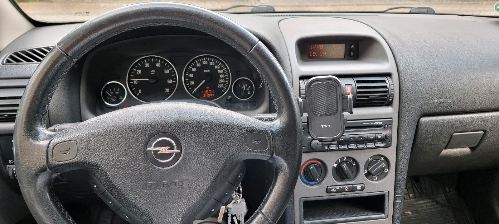 Opel Astra 2004 — photo 14