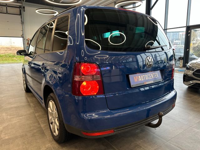 Volkswagen Touran  *7Sitzer*Navi*DSG*Sitzh*BiXenon*
