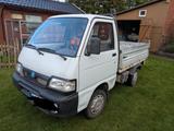 Piaggio Porter Kipper - weiße Piaggio Porter