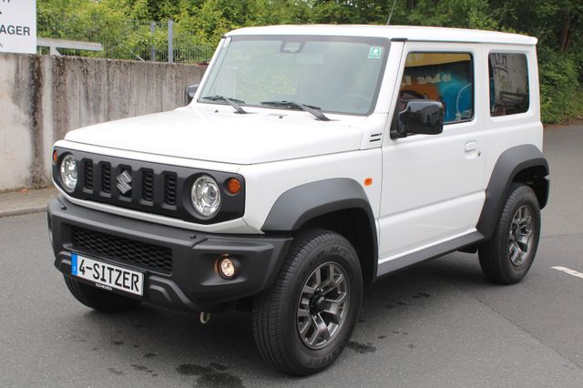 Suzuki Jimny Comfort+ AllGrip Navi Alu 9 Tkm wie Neu