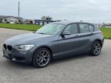 BMW 116 i *Navi,SH,PDC,Händler* - graue BMW 116
