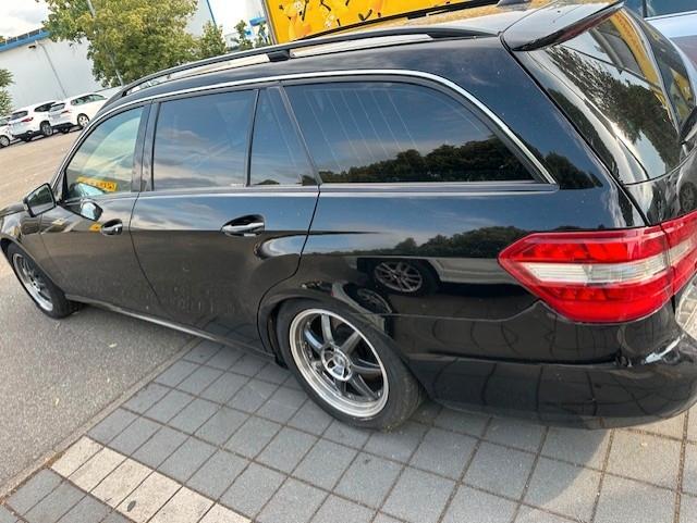 Mercedes-Benz E200 2011 — rear view