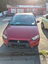 Mitsubishi Colt Lim. 5-trg. 1,3 Liter 95 PS rot - Mitsubishi mit Benzin-Antrieb: Van, Schaltgetriebe
