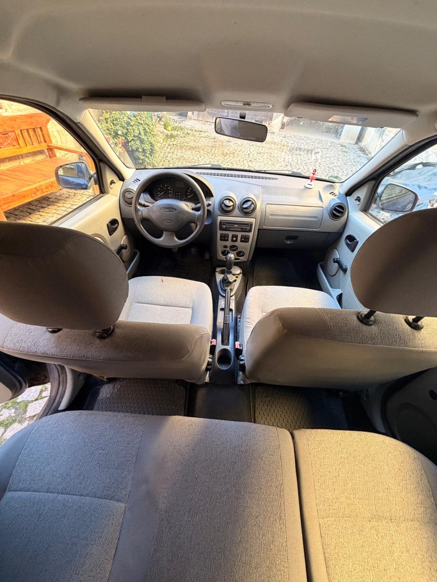 Dacia Logan 2009 — photo 13