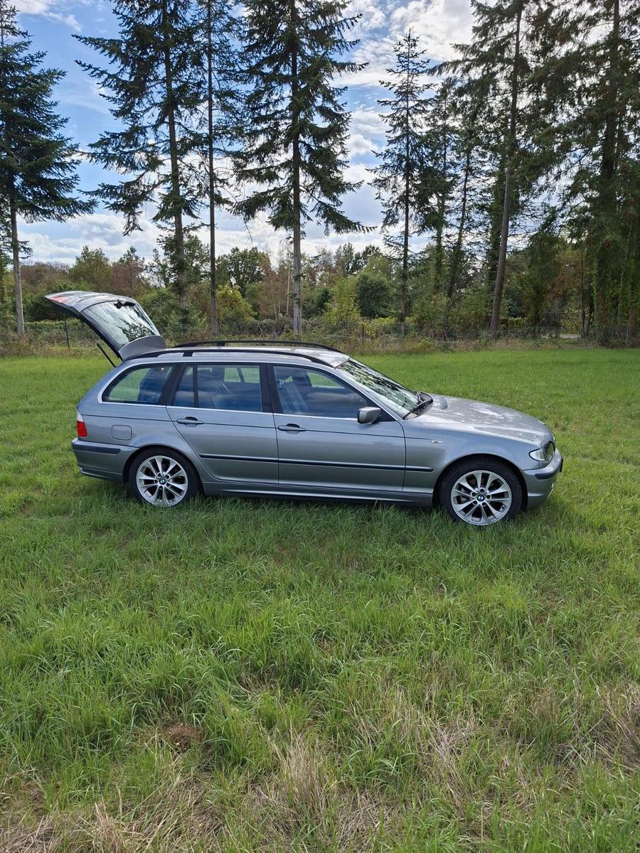 BMW 318 2005 — engine 129 HP (95kW)