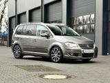 Volkswagen Touran R-Line Schiebedach Leder 7Sitze IHand - gebrauchte VW Touran aus dem Jahr 2009
