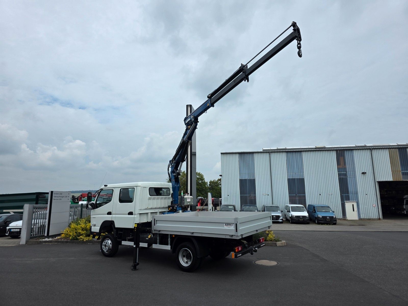 Fahrzeugabbildung Mitsubishi Fuso Canter 6C18D DoKa 4x4 Kran Atlas 65.2 - A2