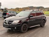 Mitsubishi Outlander 2.4 Allrad Klima S+W Reifen - gebrauchte Mitsubishi Outlander aus dem Jahr 2006