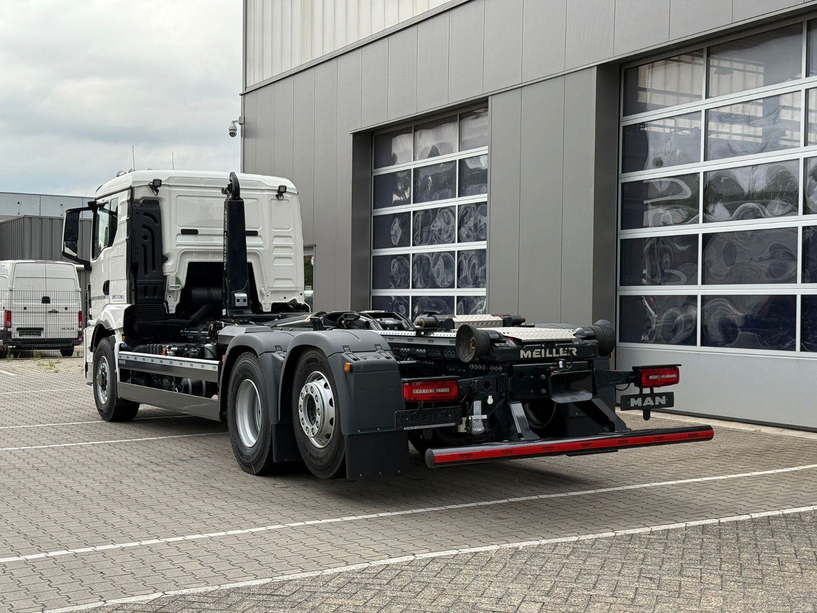 Fahrzeugabbildung MAN TGS 26.520 6x4H-2 BL MEILLER RS 21.70 Funkfernb.