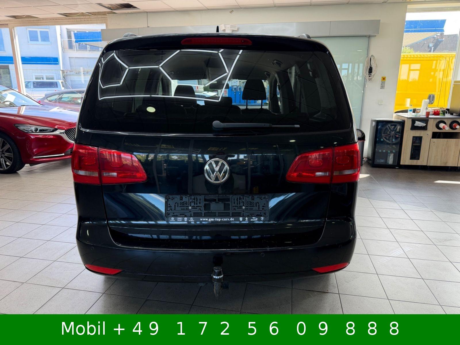 Volkswagen Touran 2011 — photo 24