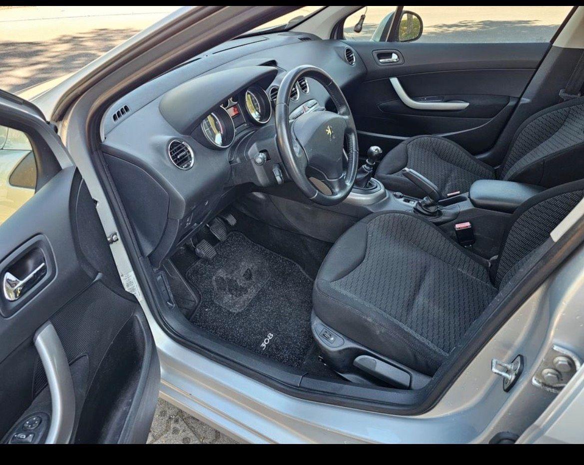 Peugeot 308 2009 — photo 12