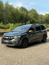 Dacia Jogger Extreme+ 7-Sitzer Zeder-Grün Media NavTOP - gebrauchte Dacia Jogger aus dem Jahr 2023