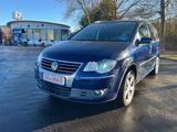 Volkswagen Touran Highline/Automatik/Xenon/PDC/7Sitzer - Volkswagen Touran aus 2007: Highline
