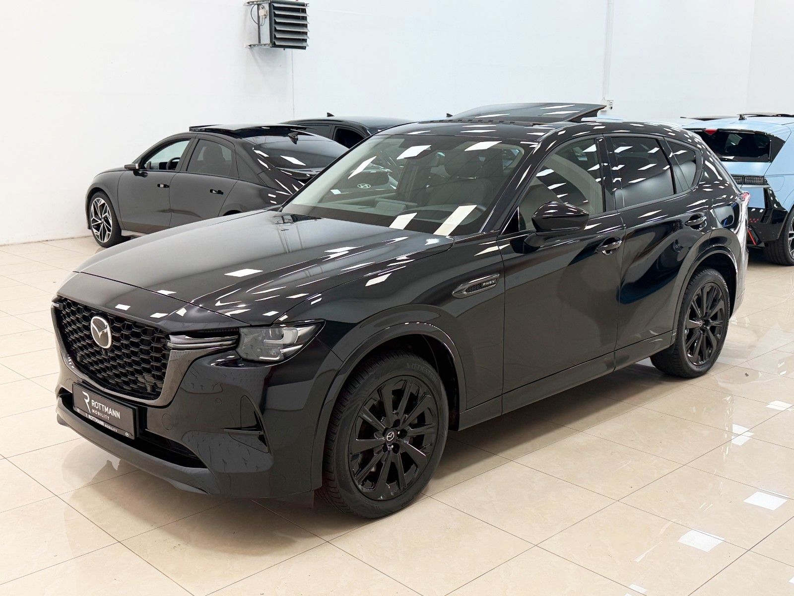 Mazda CX-60 PHEV AWD Aut. HOMURA CON/DRI/COM/PAN-P/ACC imagem 2