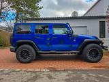 Jeep Wrangler Unlimited Sahara 2.8 CRD Autom. Sahara - Jeep Wrangler Gebrauchtwagen in München