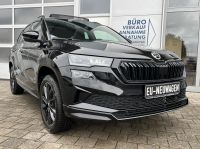 SKODA Karoq 1.5 TSI DSG Sportline PANO KAM AHK 4JGAR bei Autohaus Landmann & Maier OHG