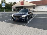 BMW X4 M40d-Saphirschwarz Metallic