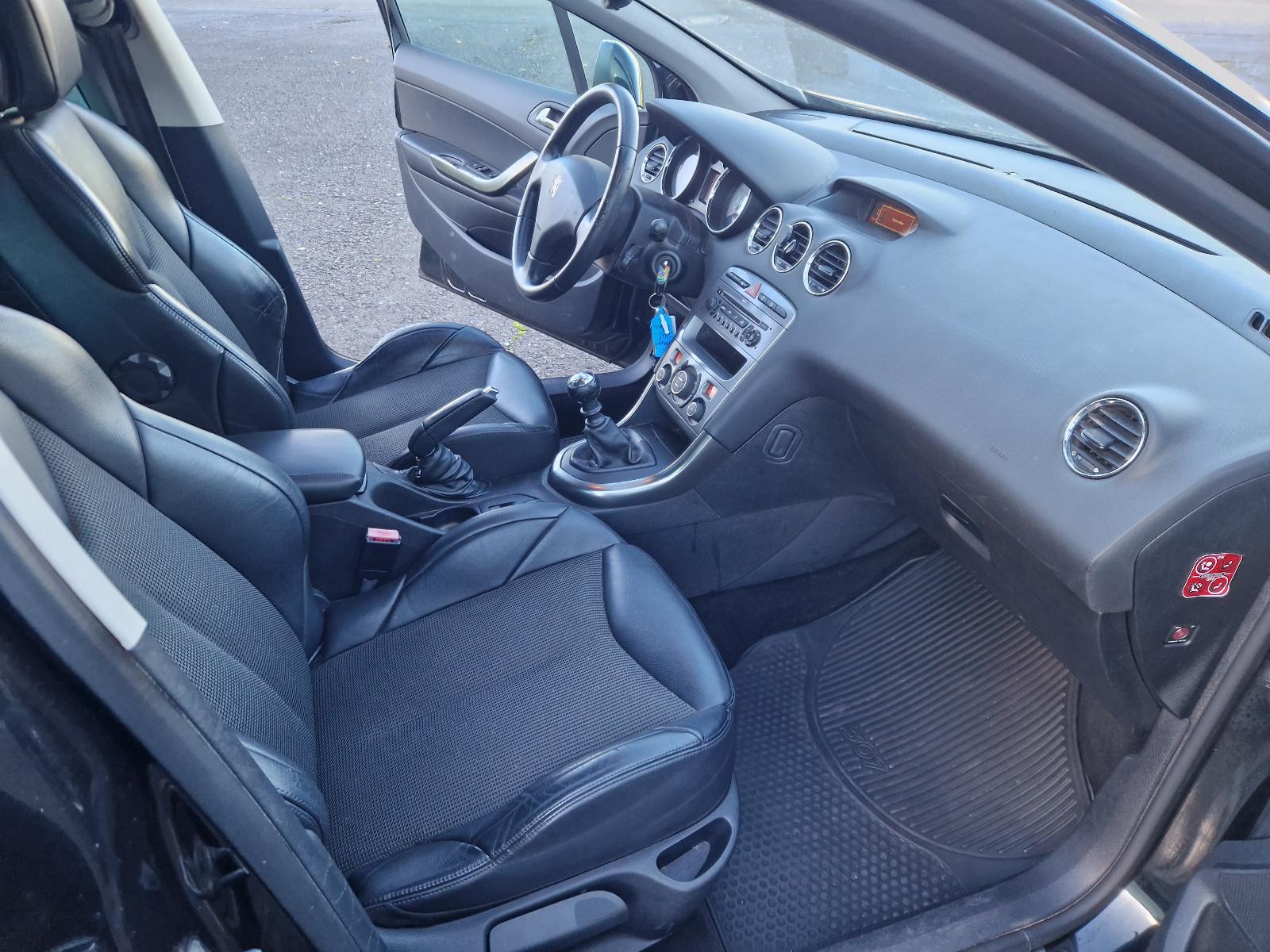 Peugeot 308 2009 — photo 9