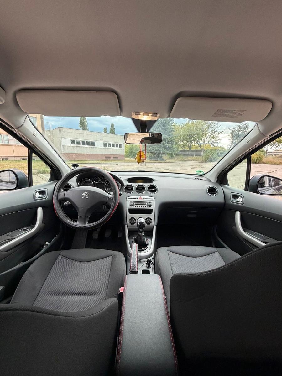 Peugeot 308 2012 — photo 9