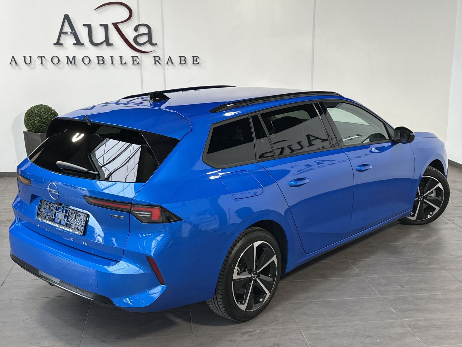 Fahrzeugabbildung Opel Astra SpT 1.6 Hybrid Elegance NAV+LED+ACC+180°