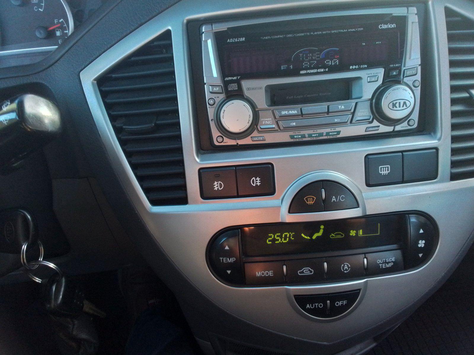 Kia Carens 2006 — photo 12