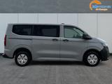 Volkswagen T7 Caravelle LR+9 Sitze+AHK+KLIMAAUT.+KAMERA+... - Volkswagen T7 Caravelle Tageszulassungen