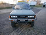 Nissan-Datsun Pickup 4X4 Benziner Hardtop  - Nissan aus 1985