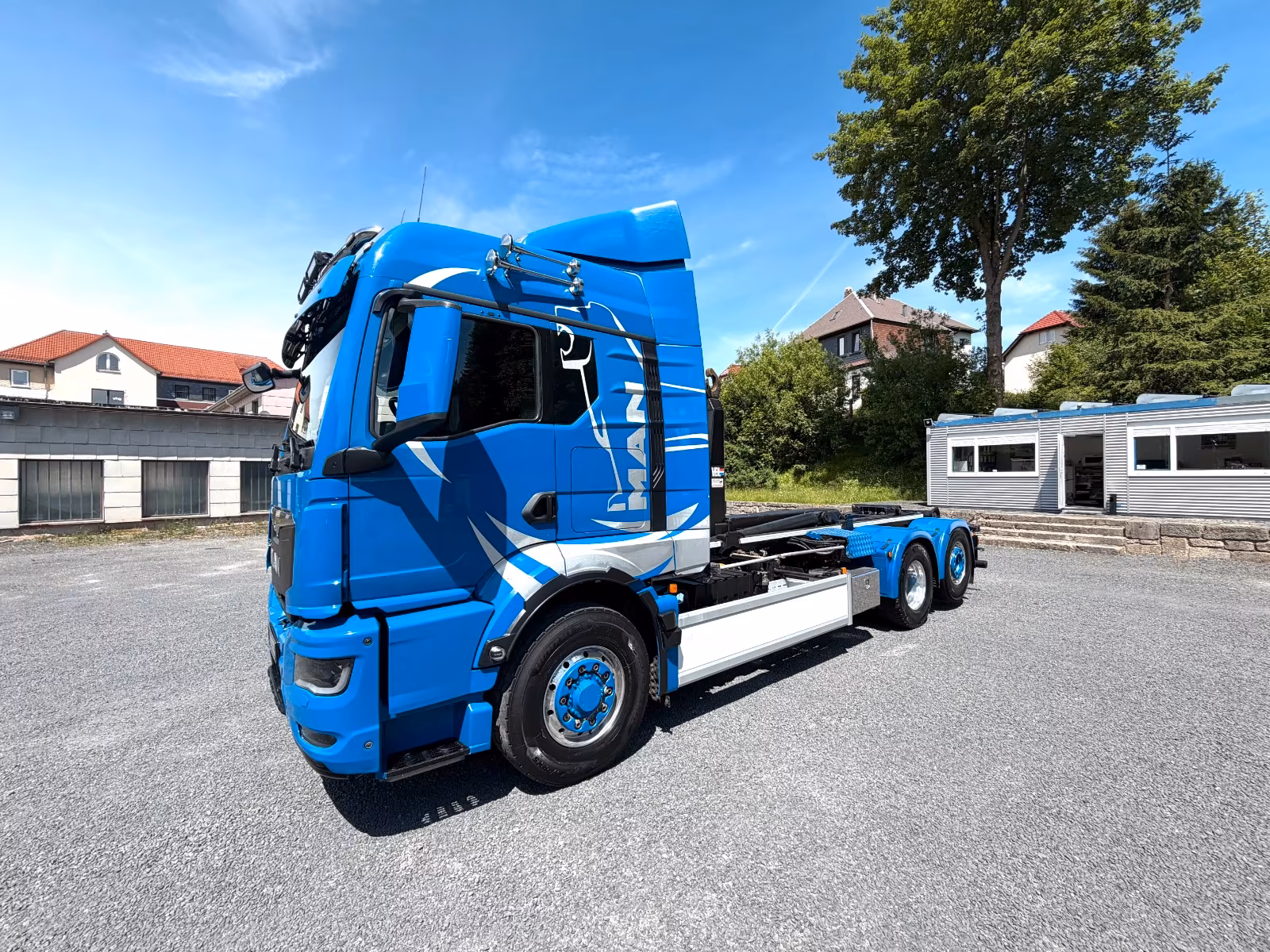 MAN TGS Abrollkipper VDL 26.510