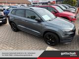 Skoda Karoq Sportline 1.5 TSI ACT DSG  Sportpaket AD D - mit Benzin-Antrieb: Grau, Geländewagen, Sportpaket