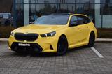 BMW M5 Touring DR.ASS.PRO.PANO.360°.4ZONEN.LHZ.AHK - BMW M5: Gelb