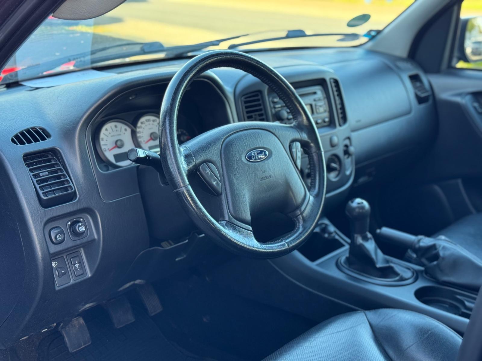 Ford Maverick 2005 — photo 10