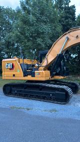 CAT 323 Kettenbagger  OQ70/55 - Angebote